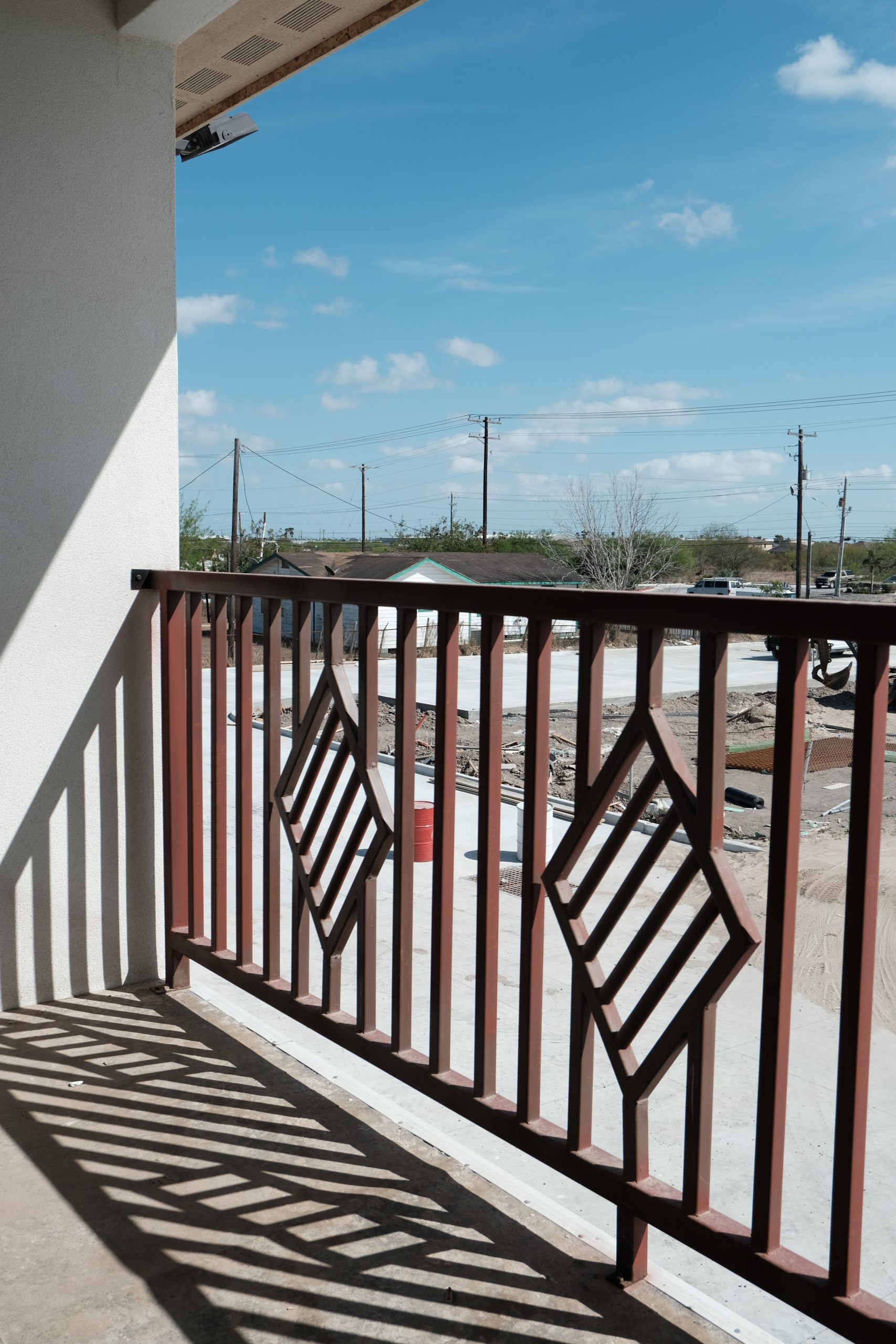 Custom balcony railings in Brownsville, TX — multifamily railing fabrication by Torres Metals.