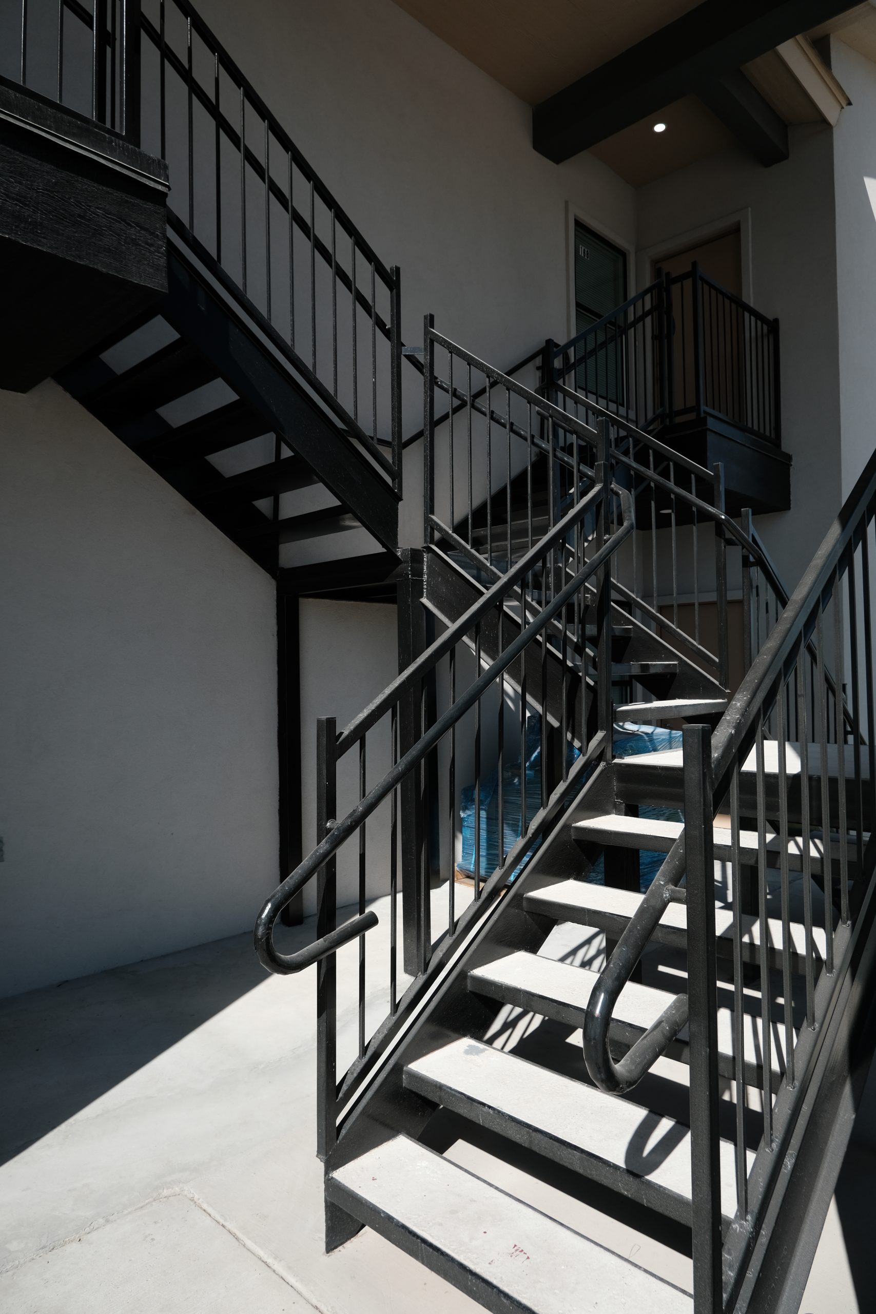 Custom metal staircase and railings in Brownsville, TX — Torres Metals fabrication and installation.