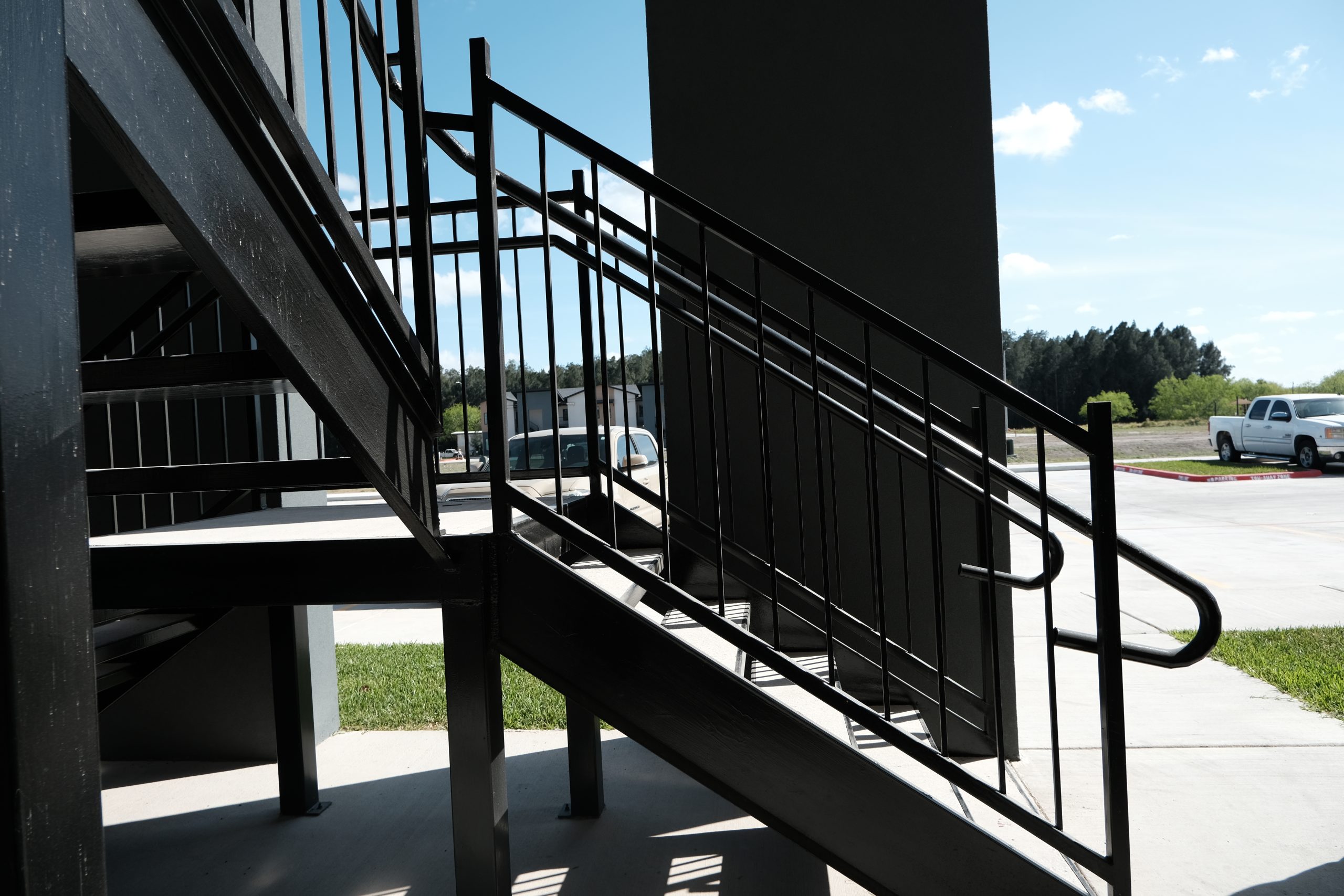 Steel staircase and railings — Brownsville multifamily build by Torres Metals.