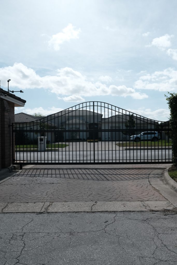 Custom iron driveway gates — Brownsville private community by Torres Metals.